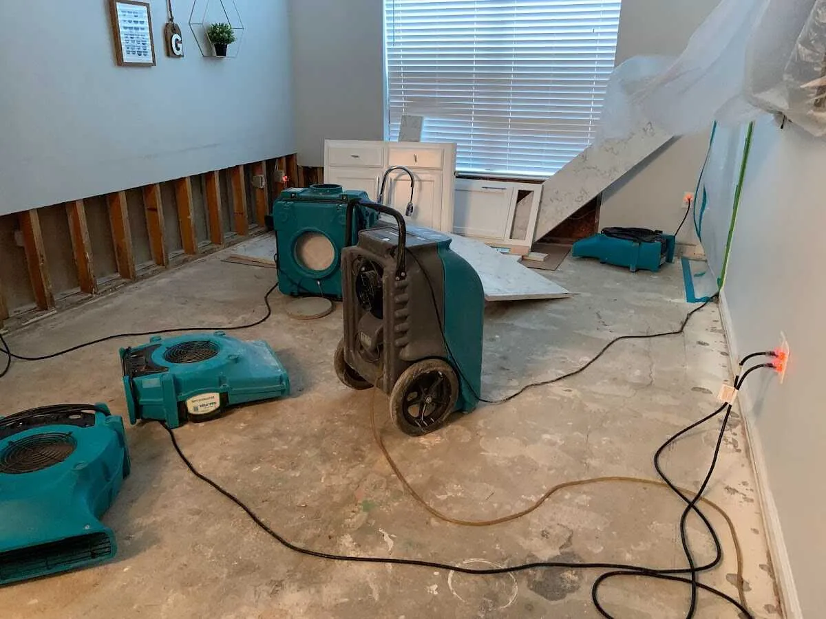 Dehumidifier in flood-cut room for Water Damage Restoration in Palm City